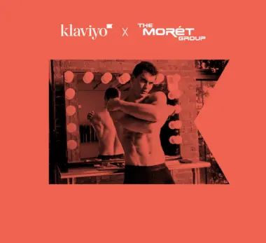Klaviyo logo and The Moret Group logo with picture of shirtless man crossing their arms; image is outlined by the Klaviyo flag icon