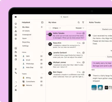 Helpdesk interface on a computer screen showing a list of customer inquiries via WhatsApp, email, and other channels.